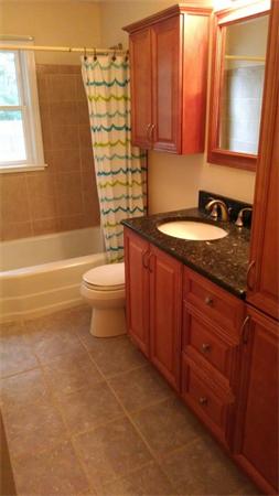 69 Ardmore Road Framingham, MA 01702 - Photo 17 of 30 a bathroom with a granite countertop sink toilet and shower