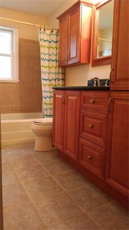 69 Ardmore Road Framingham, MA 01702 - Photo 18 of 30 a bathroom with a sink a toilet and bathtub