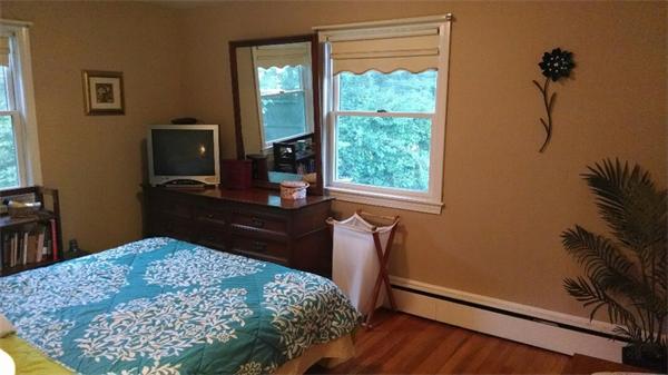 69 Ardmore Road Framingham, MA 01702 - Photo 19 of 30 a bedroom with a bed and wooden floor