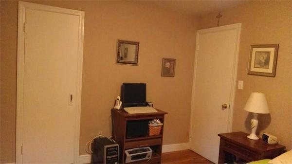 69 Ardmore Road Framingham, MA 01702 - Photo 23 of 30 a view of a workspace with furniture and wooden floor