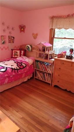 69 Ardmore Road Framingham, MA 01702 - Photo 24 of 30 a bedroom with a bed and large windows