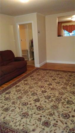 69 Ardmore Road Framingham, MA 01702 - Photo 3 of 30 a living room with a couch