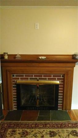69 Ardmore Road Framingham, MA 01702 - Photo 5 of 30 a close view of a fireplace