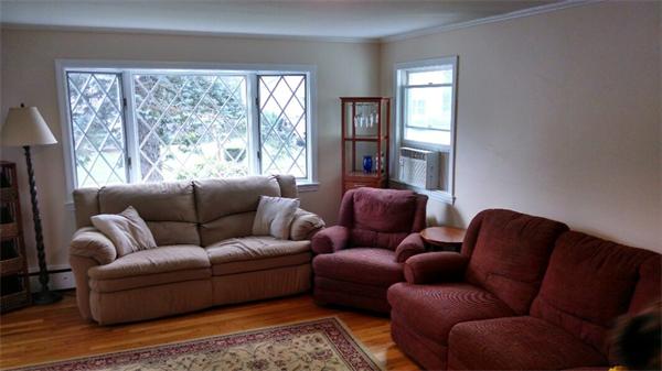 69 Ardmore Road Framingham, MA 01702 - Photo 7 of 30 a living room with furniture and a window