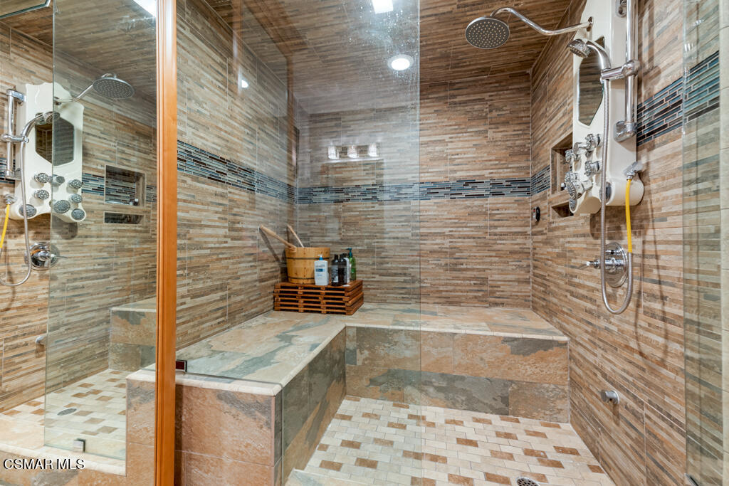 24 Kanan Road Oak Park, CA 91377 - Photo 13 of 20 a bathroom with a shower
