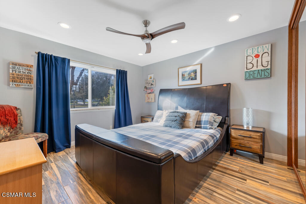 24 Kanan Road Oak Park, CA 91377 - Photo 15 of 20 a living room with a bed and a table