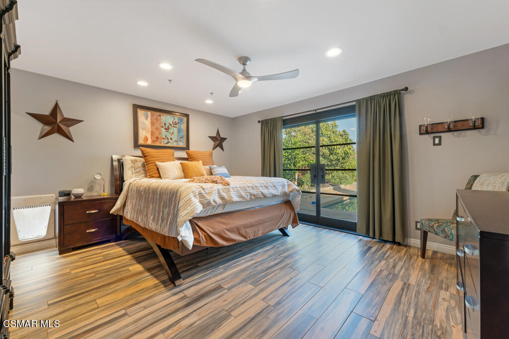 24 Kanan Road Oak Park, CA 91377 - Photo 16 of 20 a bedroom with a bed and a window