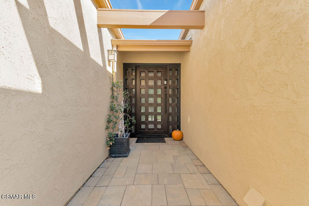 24 Kanan Road Oak Park, CA 91377 - Photo 5 of 20 a view of an entryway with a window