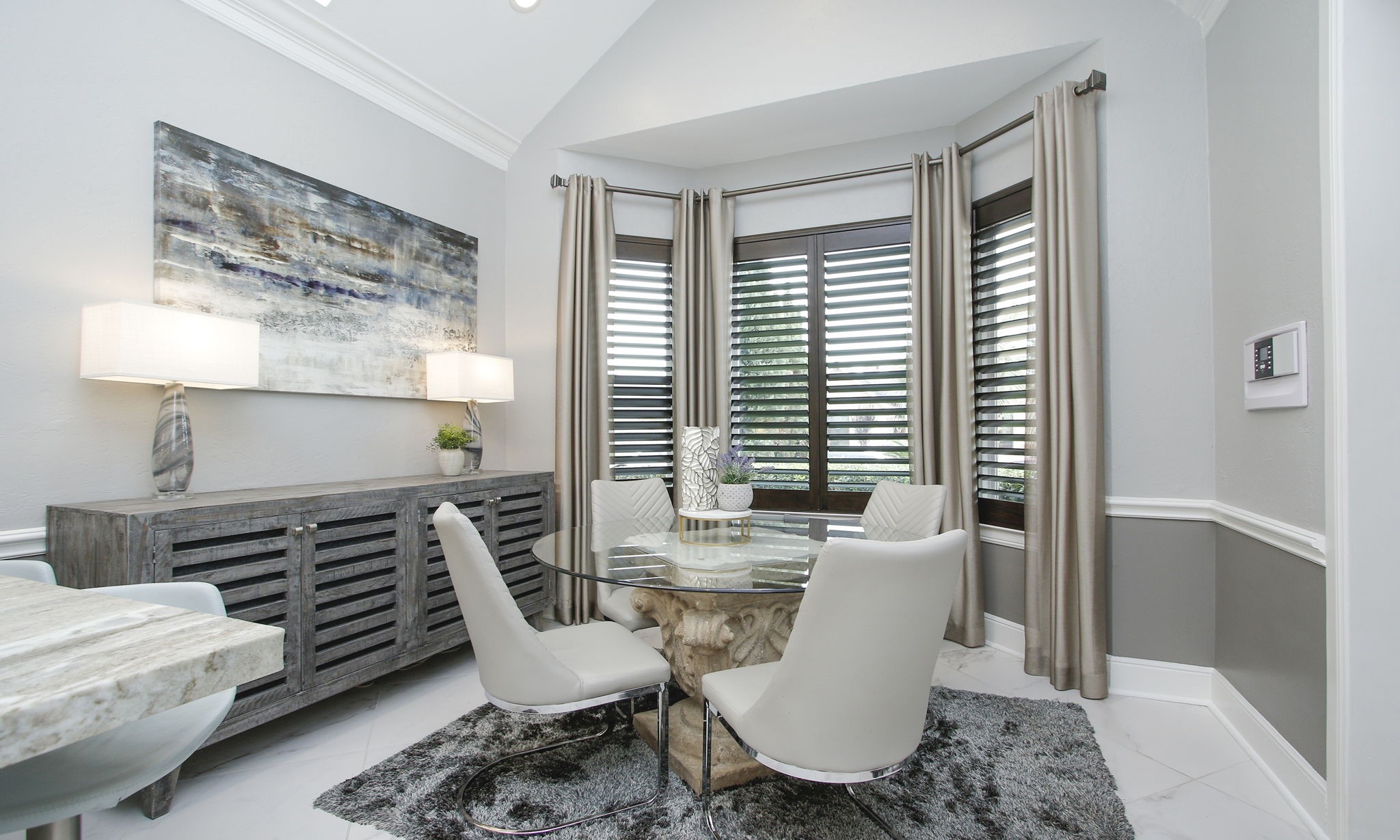 16610 Manningtree Lane Spring, TX 77379 - Photo 27 of 50 The breakfast area has tall ceilings and plantation shutters.