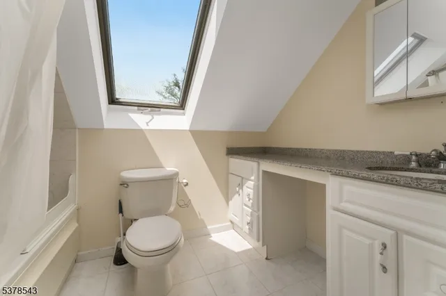 a view of a lake with a yard