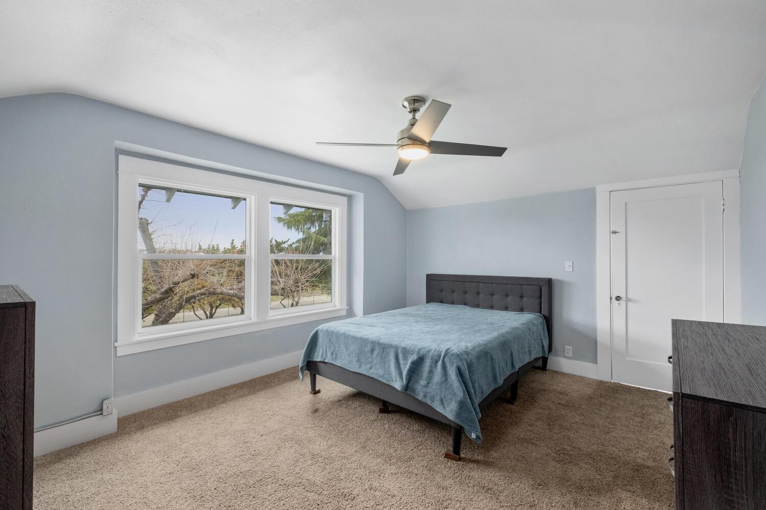 5804 Ave 426 Reedley, CA 93654 - Photo 16 of 21 a bedroom with a bed and a window