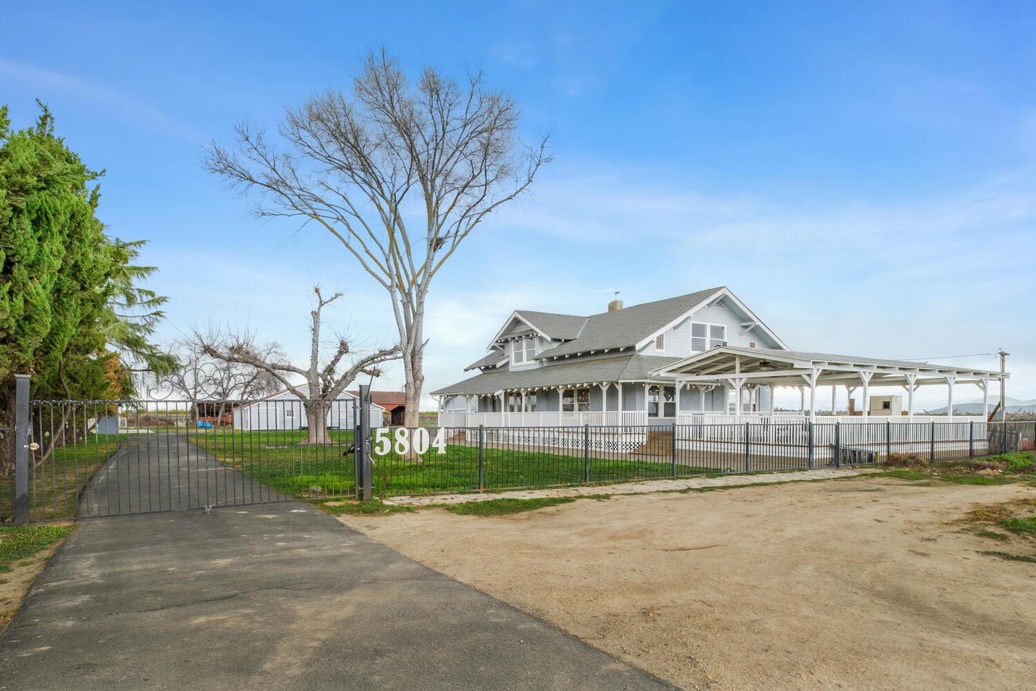 5804 Ave 426 Reedley, CA 93654 - Photo 21 of 21 a front view of a building with a garden