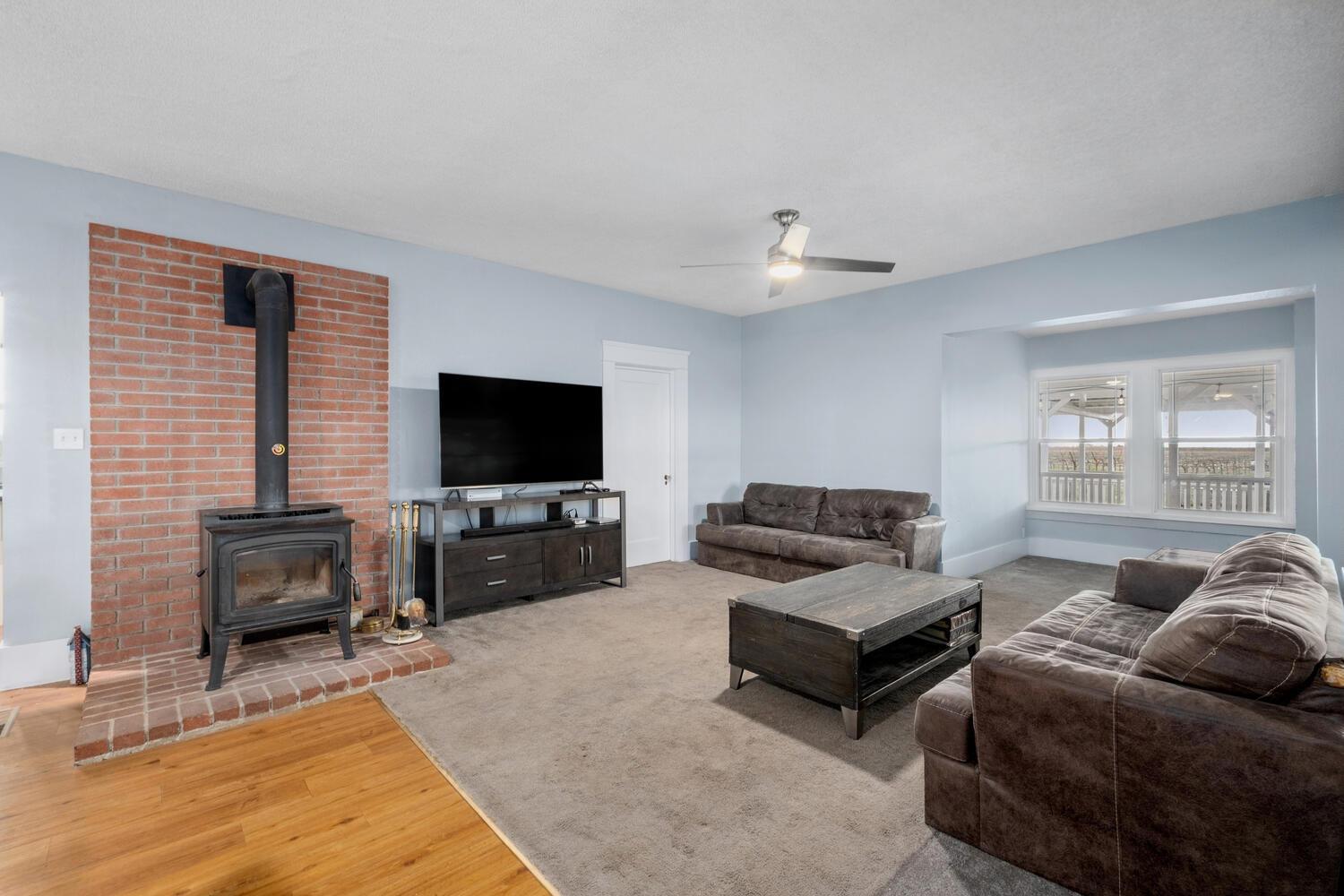 5804 Ave 426 Reedley, CA 93654 - Photo 5 of 21 a living room with furniture and a flat screen tv