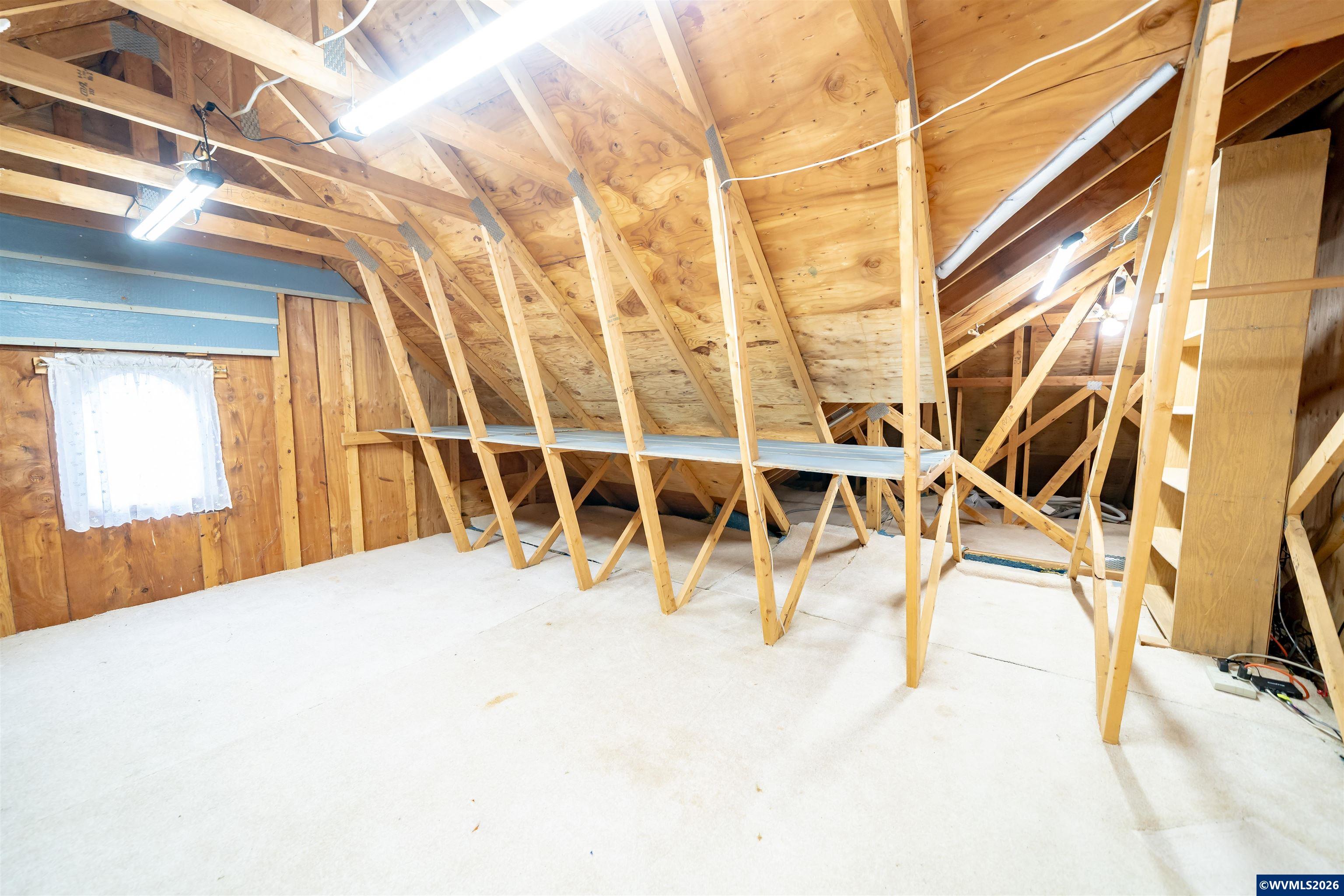 312 Southwest Cascade Meadow Drive Sublimity, OR 97385 - Photo 34 of 42 a view of a room with wooden floor and door