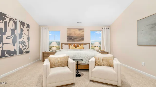 a bedroom with bed and glass window