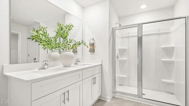 a bedroom with furniture and a bathtub