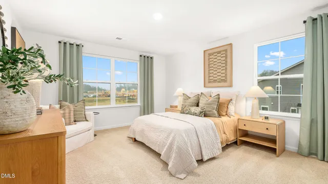 a view of a room with rack on the wall and a window