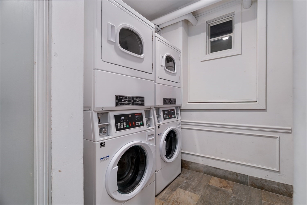 188 North Street, Unit 64 Boston, MA 02113 - Photo 3 of 27 a utility room with dryer and washer