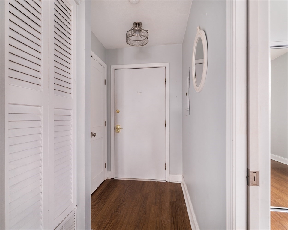 188 North Street, Unit 64 Boston, MA 02113 - Photo 5 of 27 a view of a hallway with wooden floor