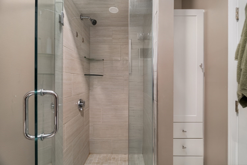 188 North Street, Unit 64 Boston, MA 02113 - Photo 7 of 27 a bathroom with a shower