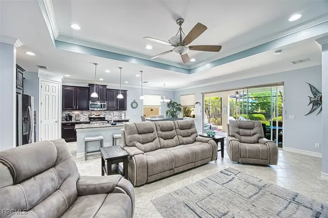 a bedroom with a large bed and a flat screen tv