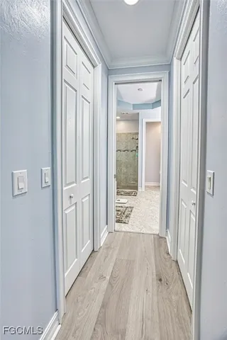 a spacious bathroom with a bathtub sink and mirror