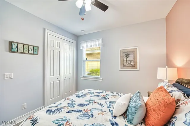 a bedroom with furniture and white walls
