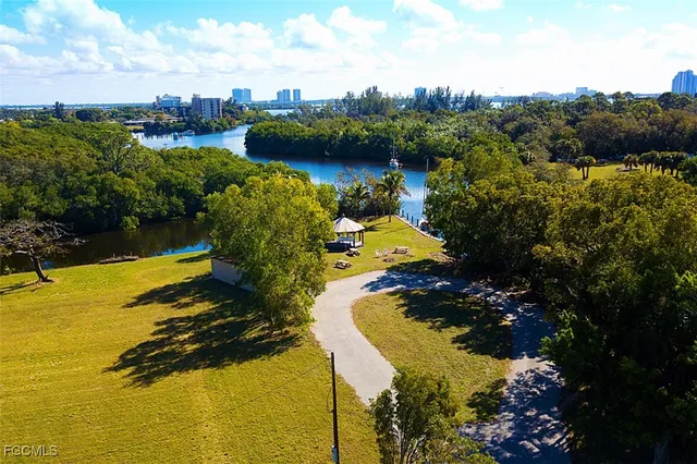 a view of a swimming pool with lounge chair