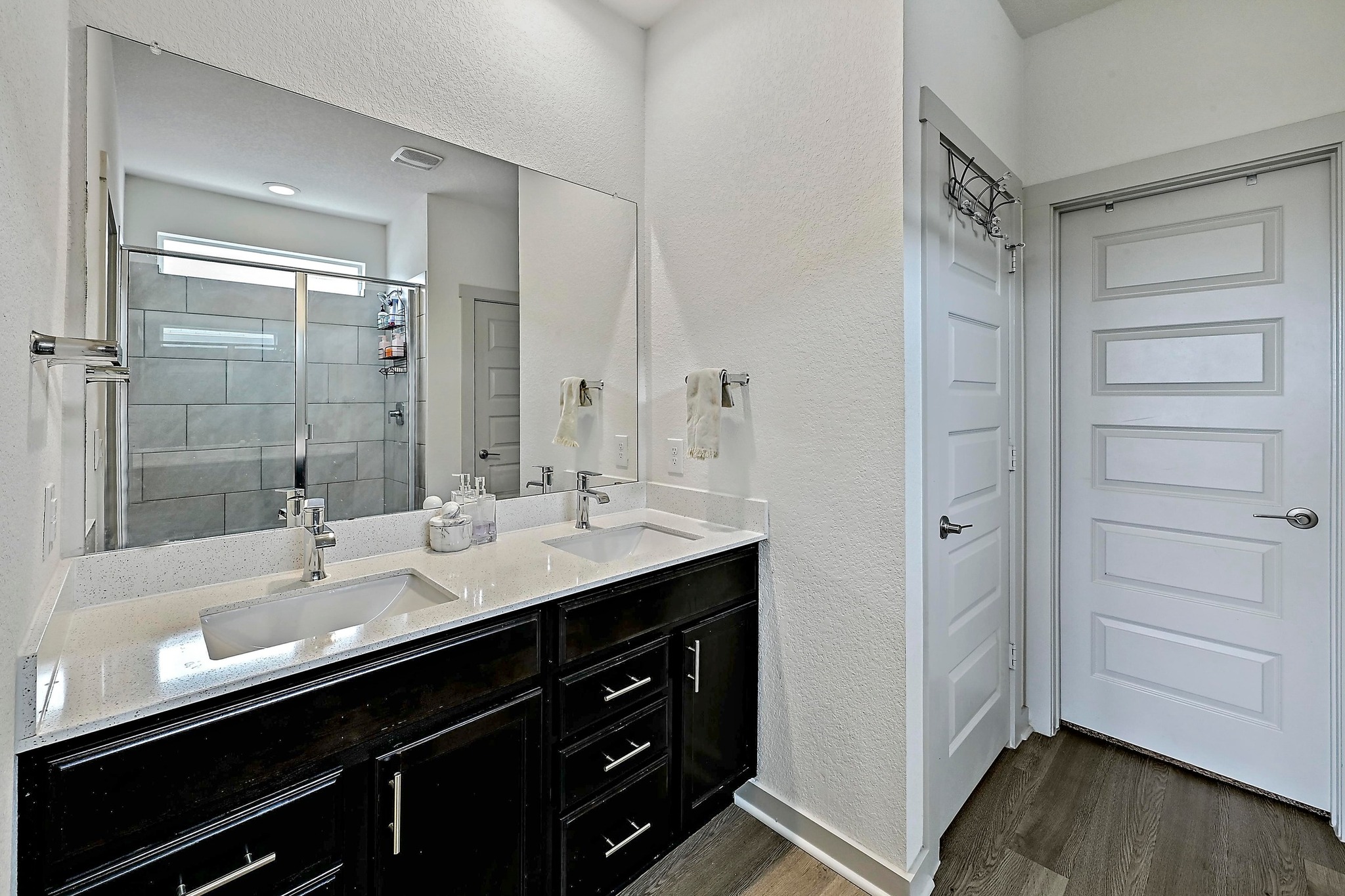 7712 Linnie Lane Austin, TX 78724 - Photo 17 of 37 a bathroom with a double vanity sink a and mirror