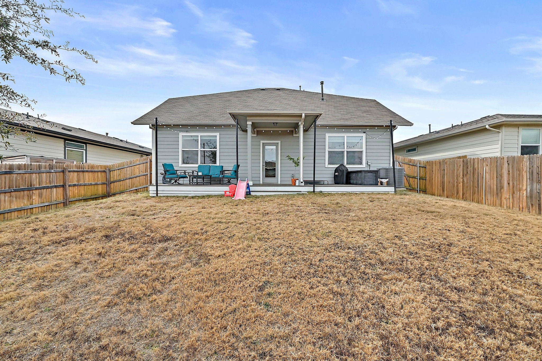 7712 Linnie Lane Austin, TX 78724 - Photo 32 of 37 a front view of a house with a yard