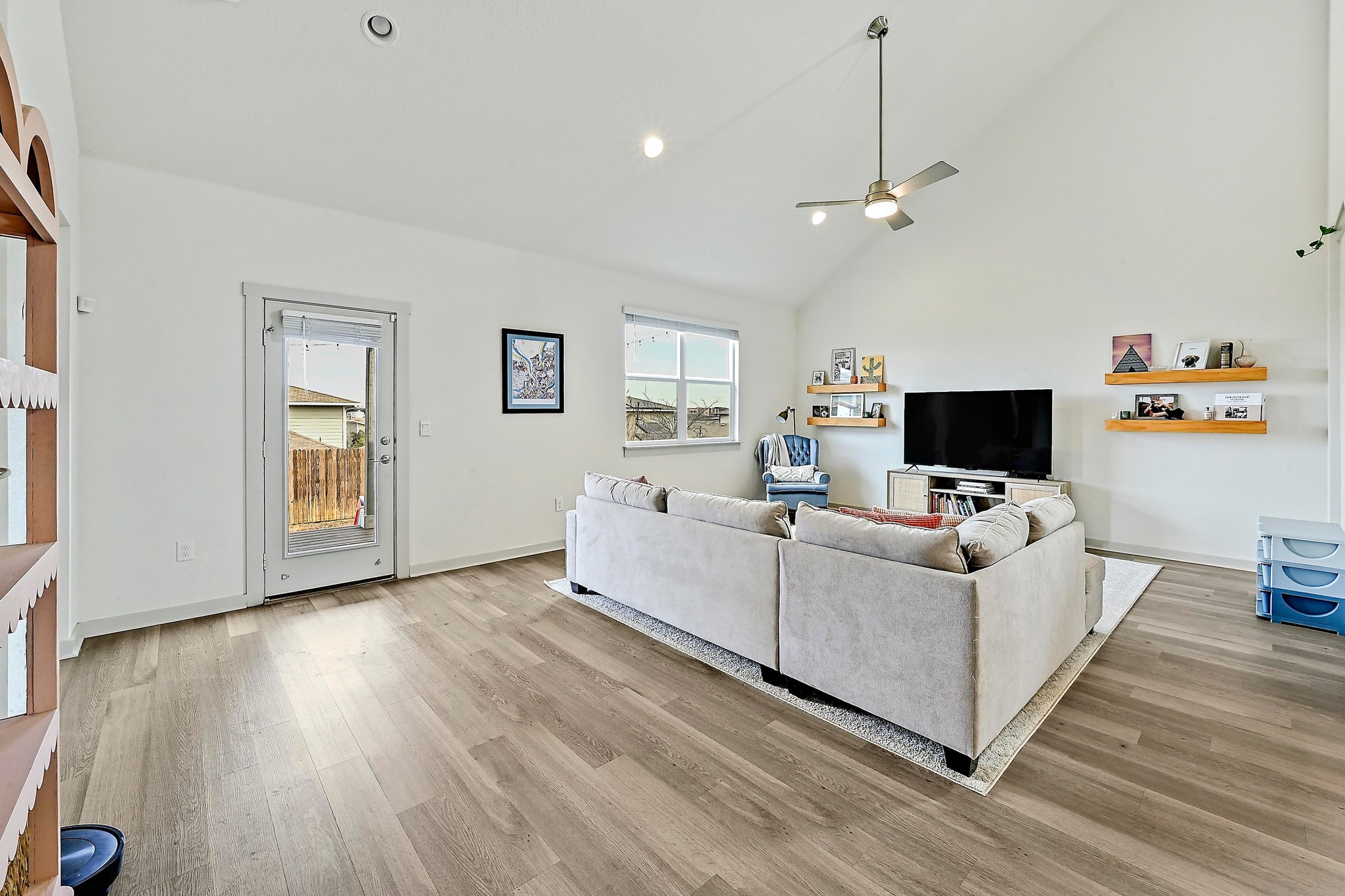 7712 Linnie Lane Austin, TX 78724 - Photo 37 of 37 a living room with furniture and a flat screen tv