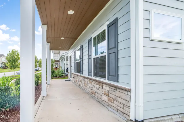 a view of a livingroom with furniture a fireplace