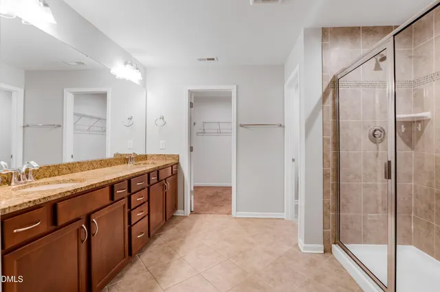 a view of a balcony with wooden floor
