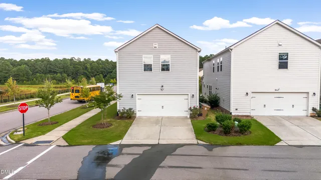 an aerial view of a house with a garden