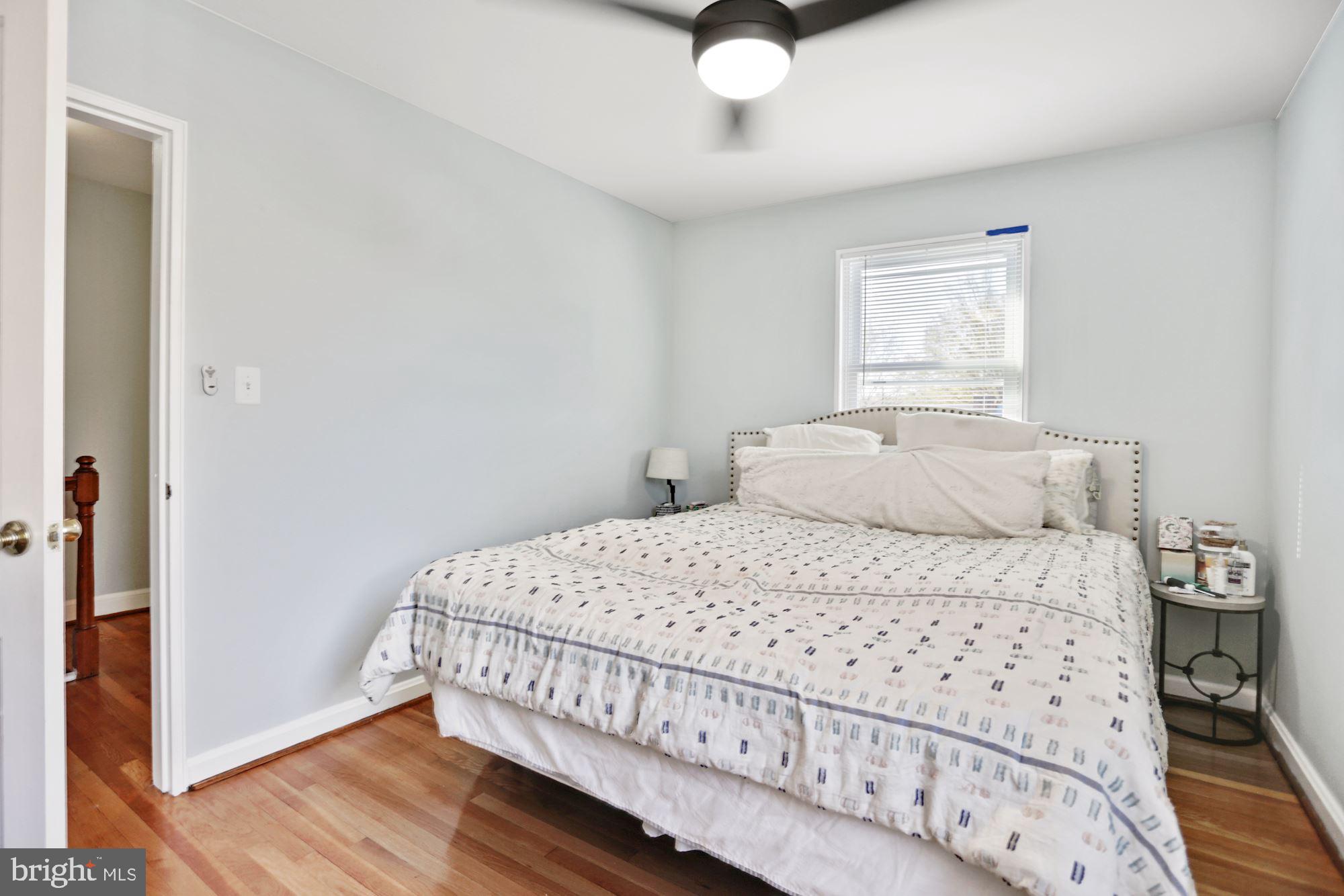 4910 Sargent Road Northeast Washington, DC 20017 - Photo 11 of 16 a bedroom with a bed and a window