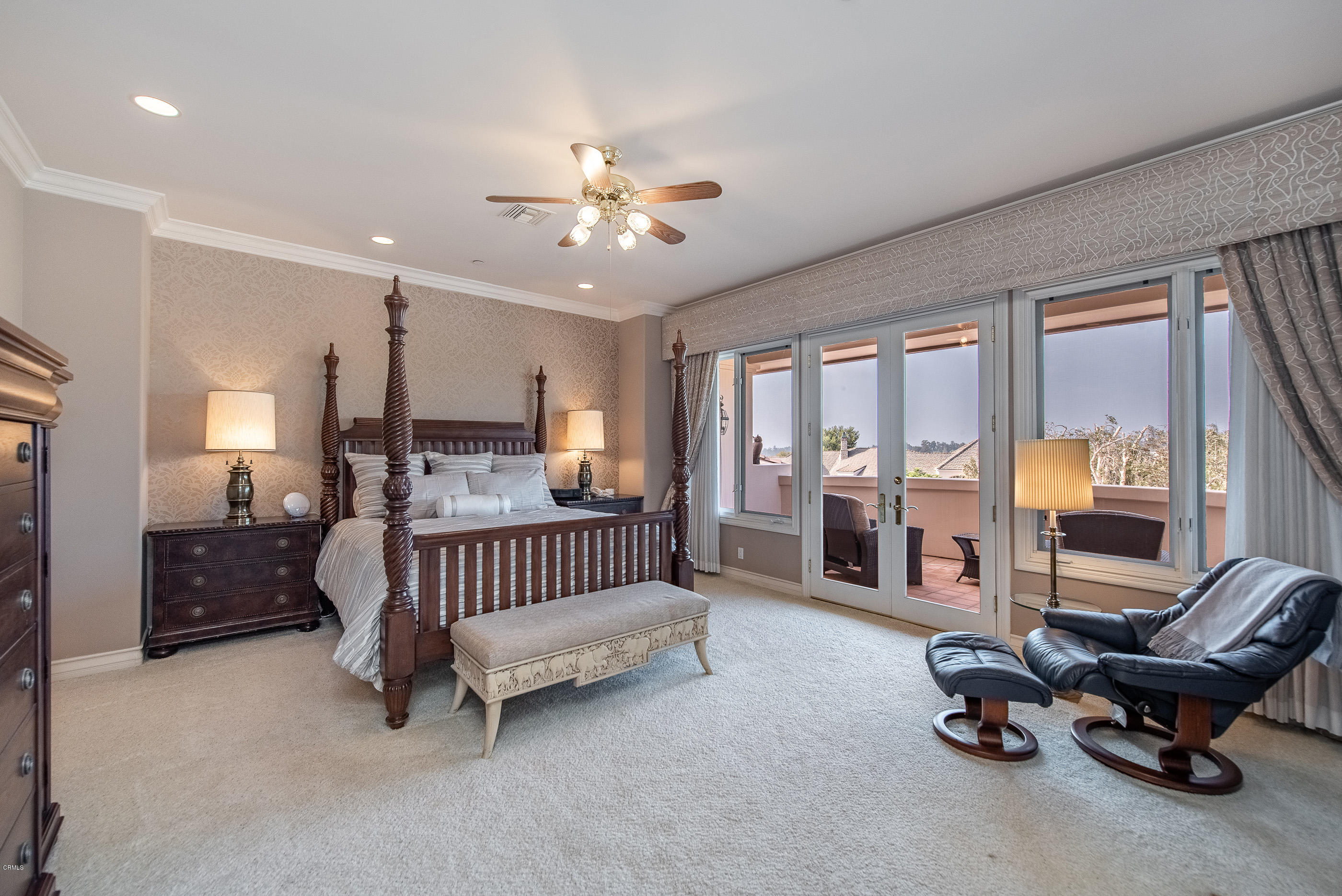 657 Corte Corrida Camarillo, CA 93010 - Photo 41 of 74 a bedroom with furniture and a chandelier