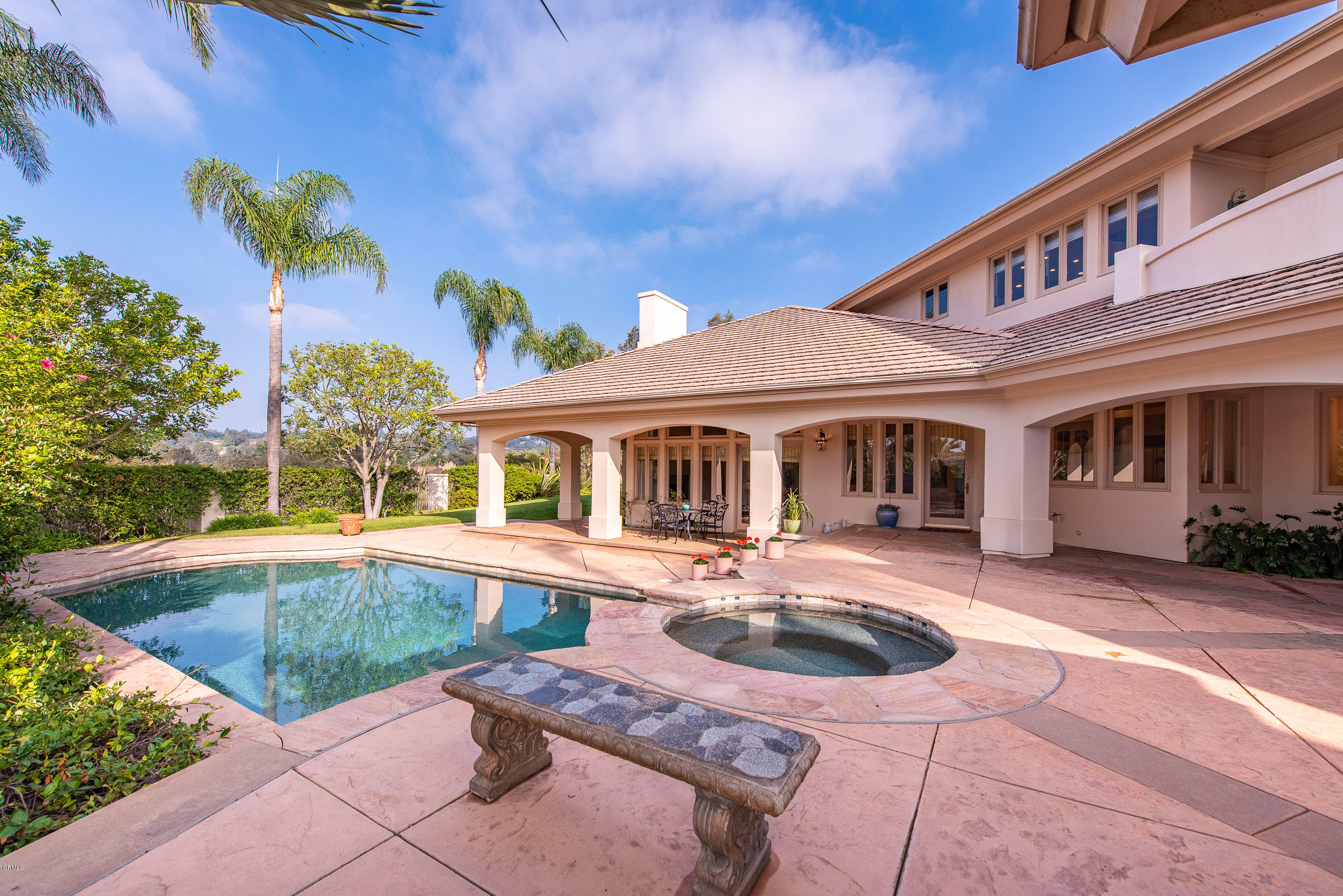 657 Corte Corrida Camarillo, CA 93010 - Photo 46 of 74 a front view of a house with swimming pool having outdoor seating
