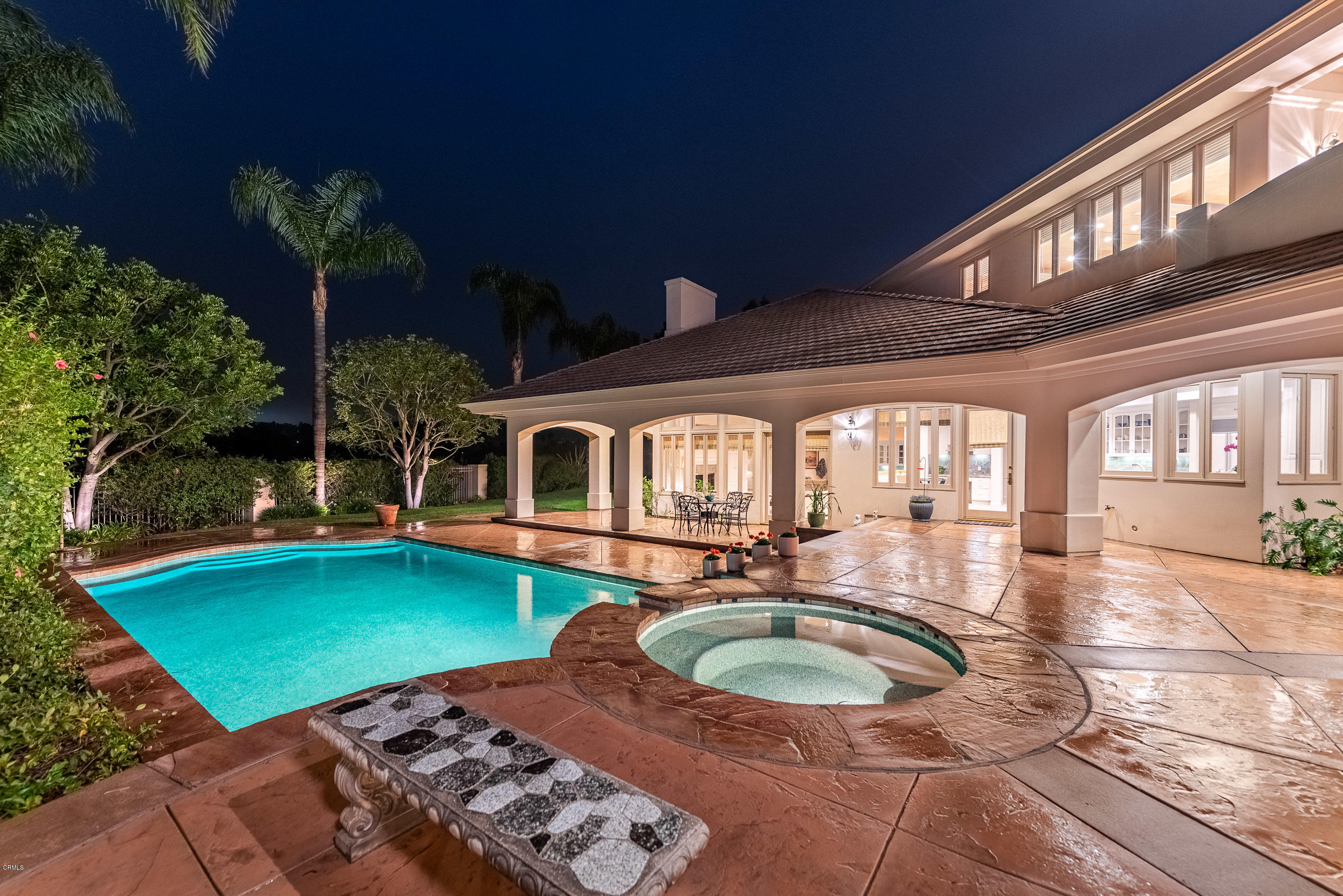 657 Corte Corrida Camarillo, CA 93010 - Photo 63 of 74 a view of a patio with table and chairs potted plants and large tree
