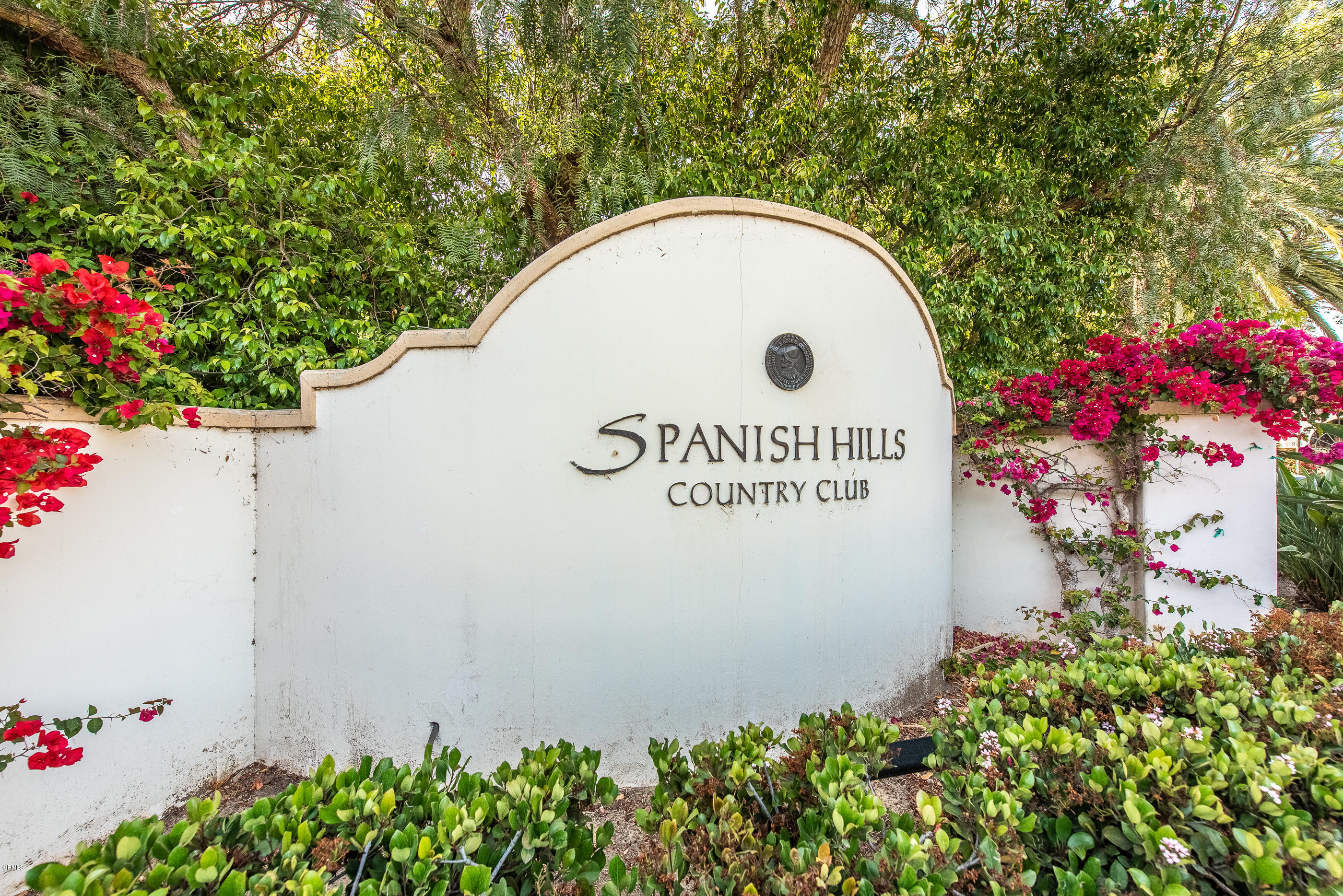 657 Corte Corrida Camarillo, CA 93010 - Photo 66 of 74 a sign that is in front of flowers