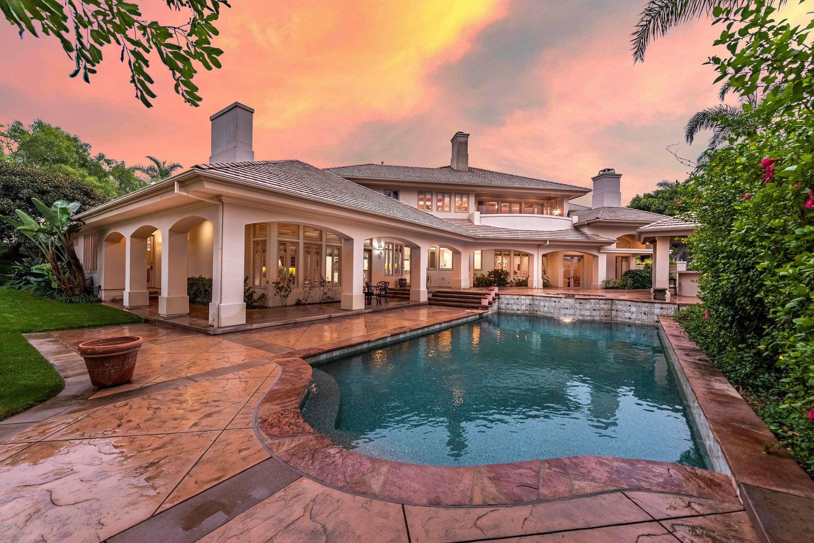 657 Corte Corrida Camarillo, CA 93010 - Photo 9 of 74 a front view of a house with swimming pool
