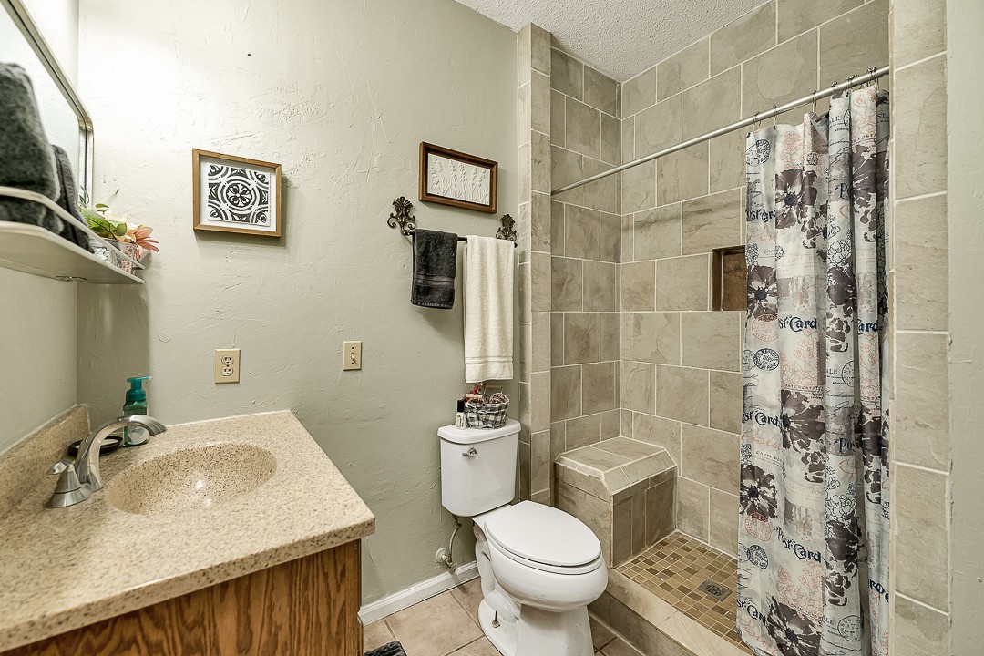 624 Faith-Rae Boulevard Morrison, TN 37357 - Photo 14 of 38 a bathroom with a sink toilet and shower