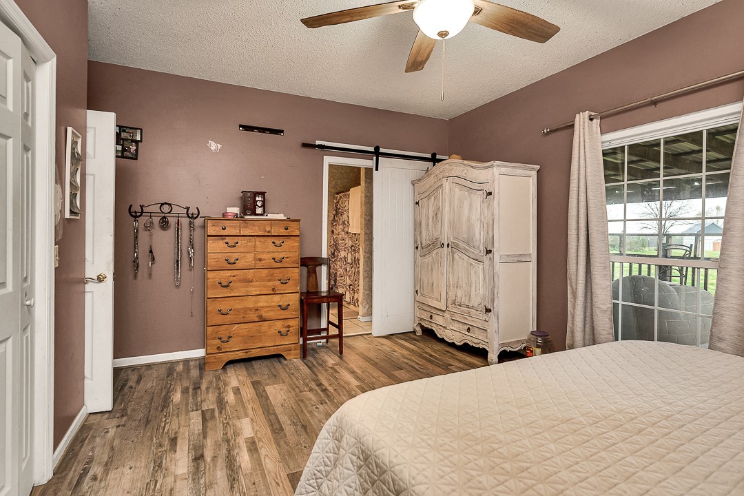 624 Faith-Rae Boulevard Morrison, TN 37357 - Photo 20 of 38 a bedroom with a bed and a dresser