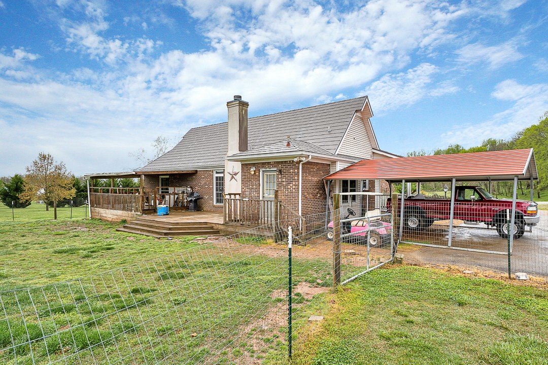 624 Faith-Rae Boulevard Morrison, TN 37357 - Photo 23 of 38 a view of a house with sitting area and a yard