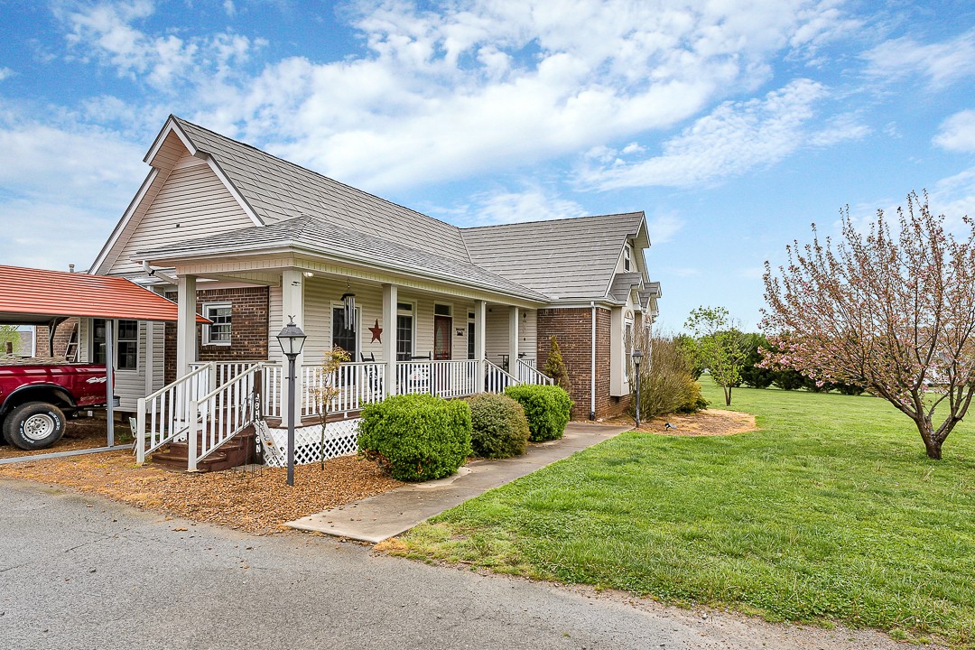 624 Faith-Rae Boulevard Morrison, TN 37357 - Photo 24 of 38 a view of a house with a yard