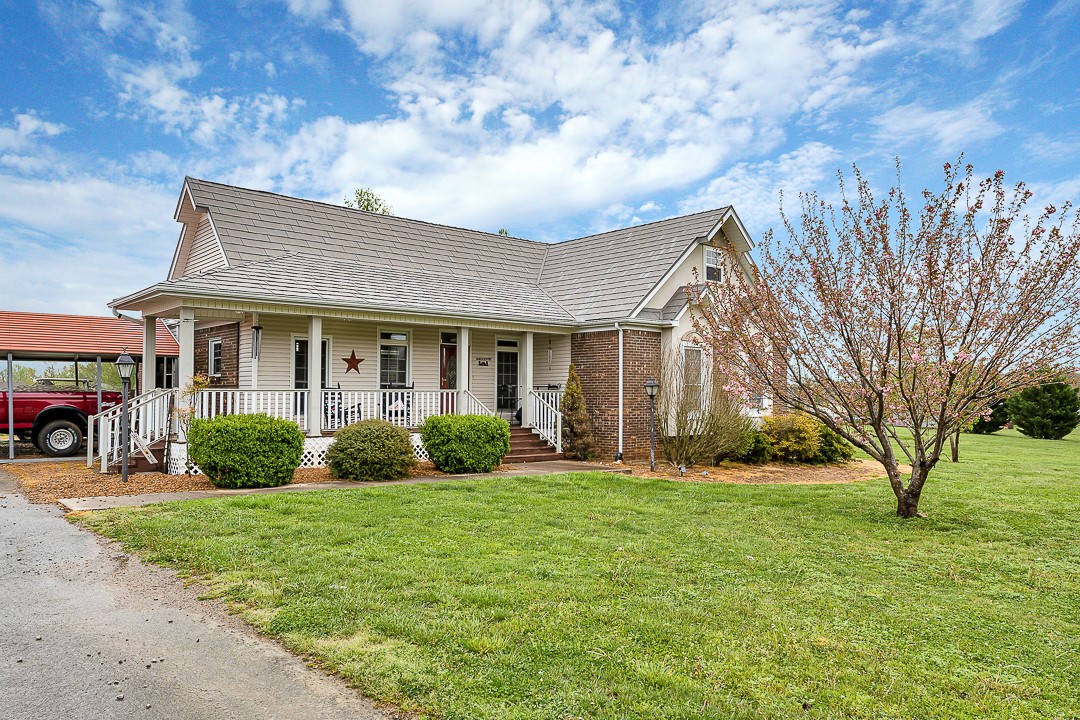 624 Faith-Rae Boulevard Morrison, TN 37357 - Photo 25 of 38 a front view of house with yard and green space