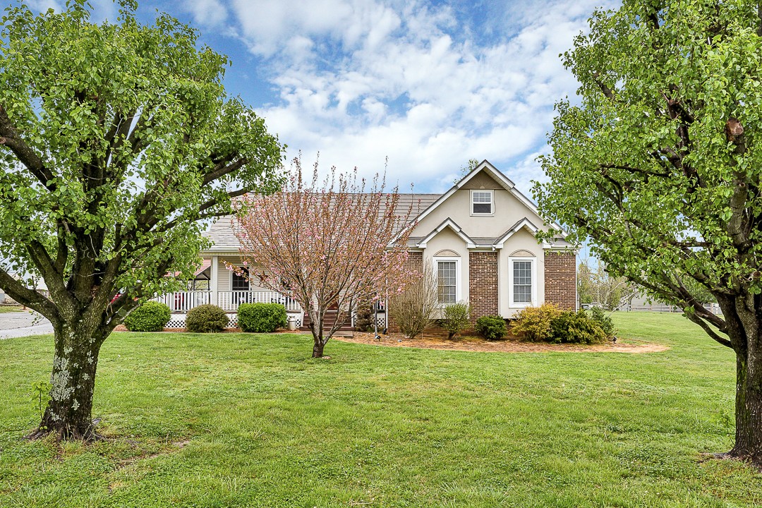 624 Faith-Rae Boulevard Morrison, TN 37357 - Photo 27 of 38 a front view of a house with garden