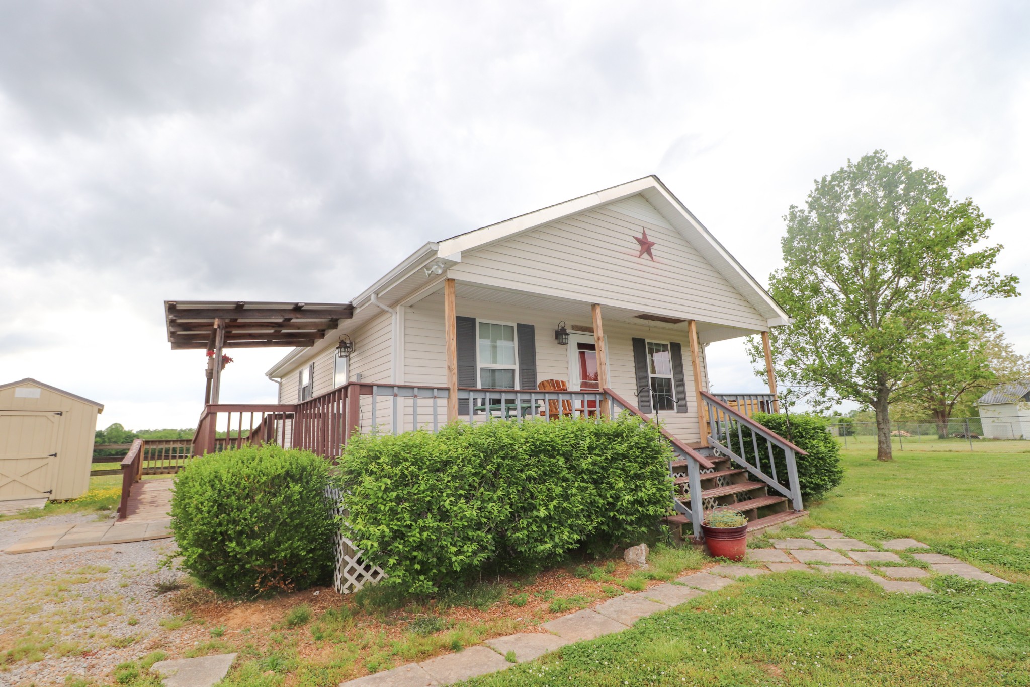 624 Faith-Rae Boulevard Morrison, TN 37357 - Photo 30 of 38 a front view of a house with a yard