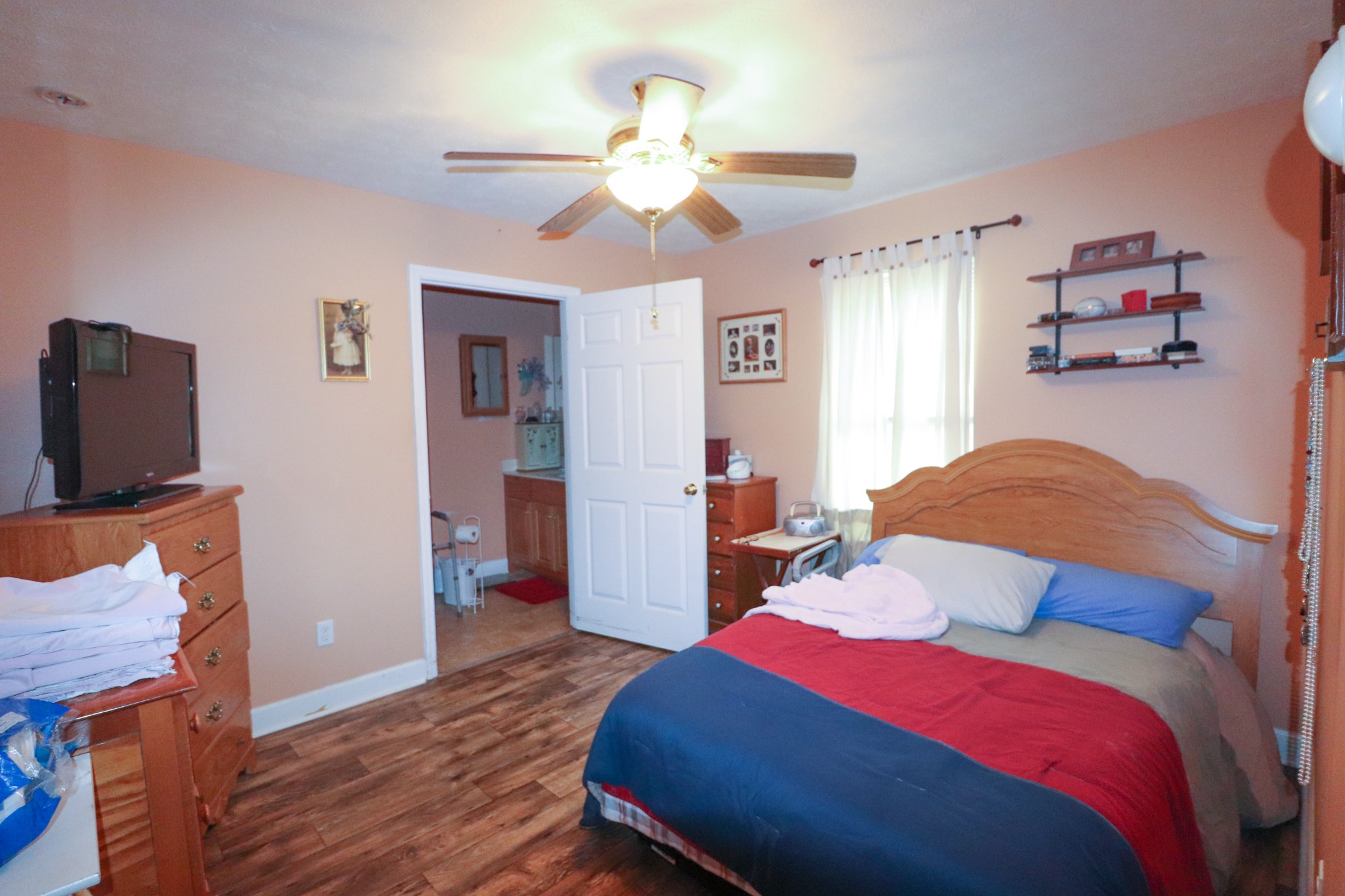 624 Faith-Rae Boulevard Morrison, TN 37357 - Photo 33 of 38 a bedroom with a bed and a flat screen tv