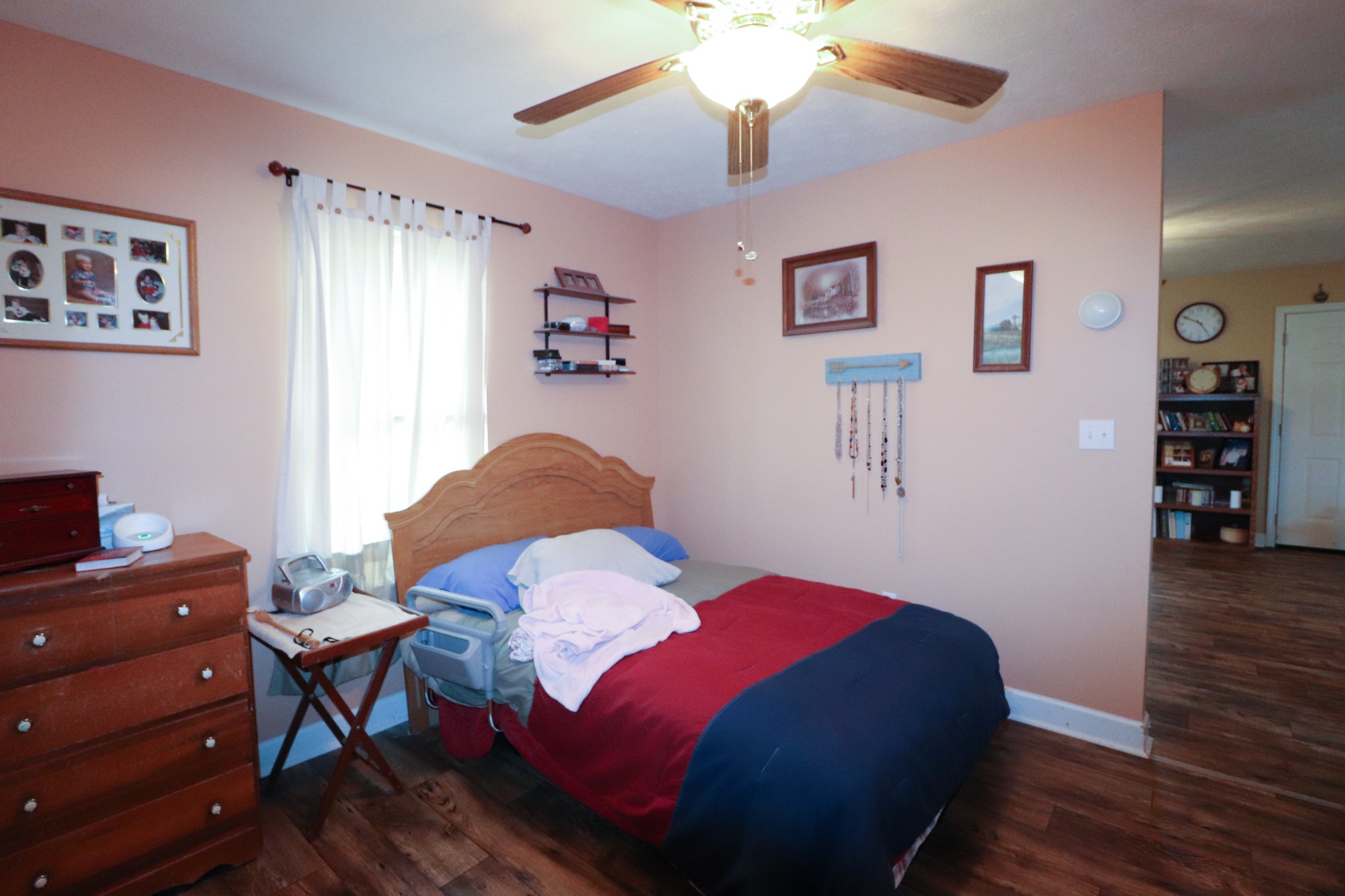 624 Faith-Rae Boulevard Morrison, TN 37357 - Photo 36 of 38 a bedroom with a bed and a bookshelf