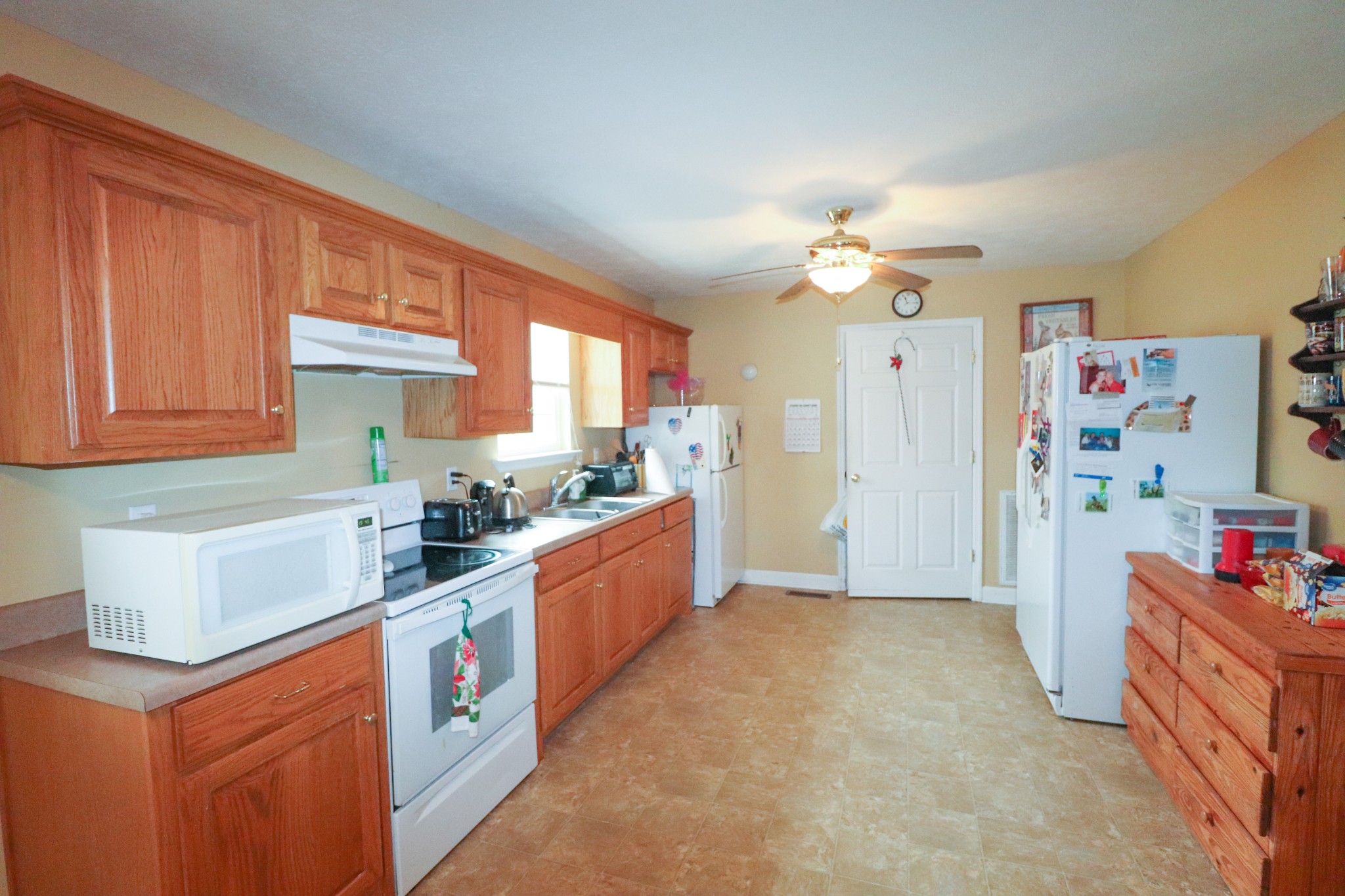 624 Faith-Rae Boulevard Morrison, TN 37357 - Photo 38 of 38 a large kitchen with stainless steel appliances granite countertop a stove cabinets and a kitchen island